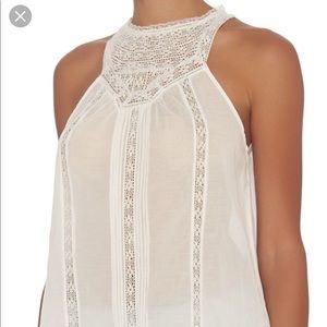 Joie white sleeveless lace top.